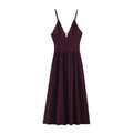 Backless accessory-decorated midi dress