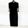 Mid length dress with five quarter sleeves