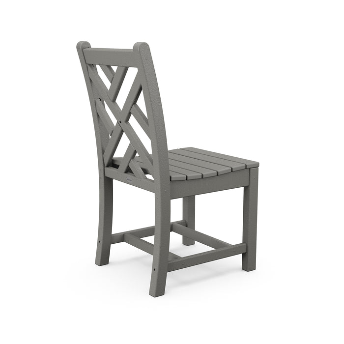 Gray POLYWOOD Chippendale Outdoor Dining Chair featuring a slatted seat and cross-back design, viewed from behind at an angle.