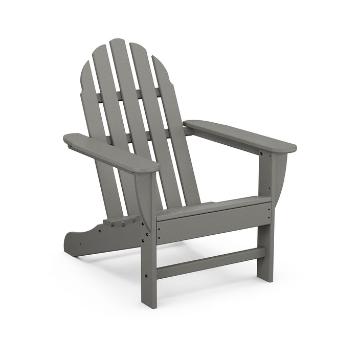 Gray POLYWOOD Classic Adirondack Chair with wide armrests and slatted backrest, made from durable lumber, viewed from the front right angle.