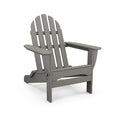 Gray POLYWOOD Classic Folding Adirondack Chair with slatted back and wide armrests, crafted from recycled plastic.