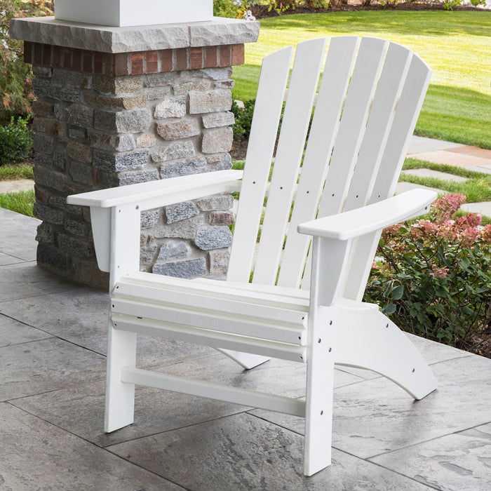 White POLYWOOD Nautical Curveback Adirondack Chair displayed on a patio.