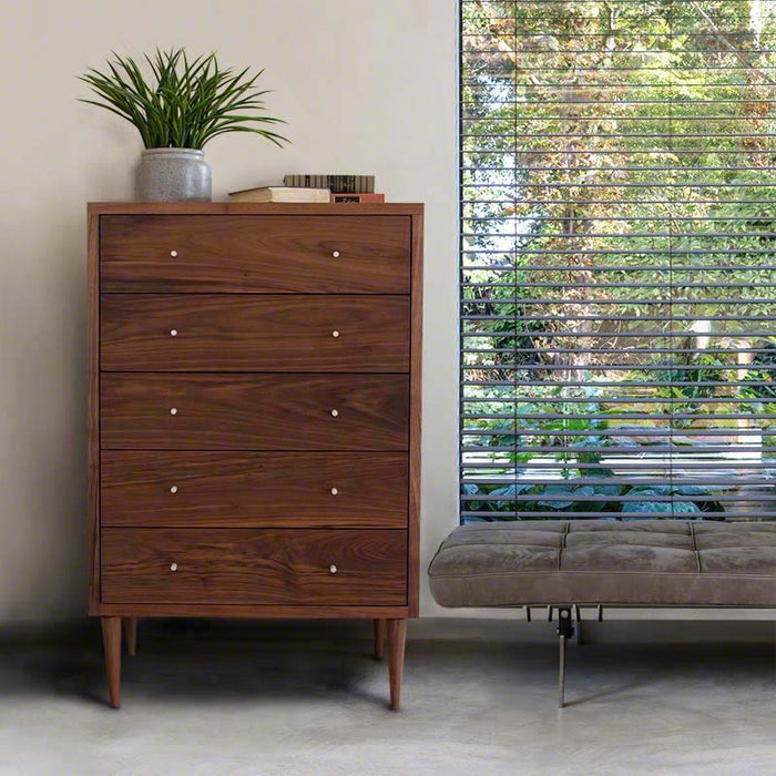 Vermont Furniture Designs dresser with radiant wood grain, showcasing heirloom-quality craftsmanship; matching bench enhances the set.